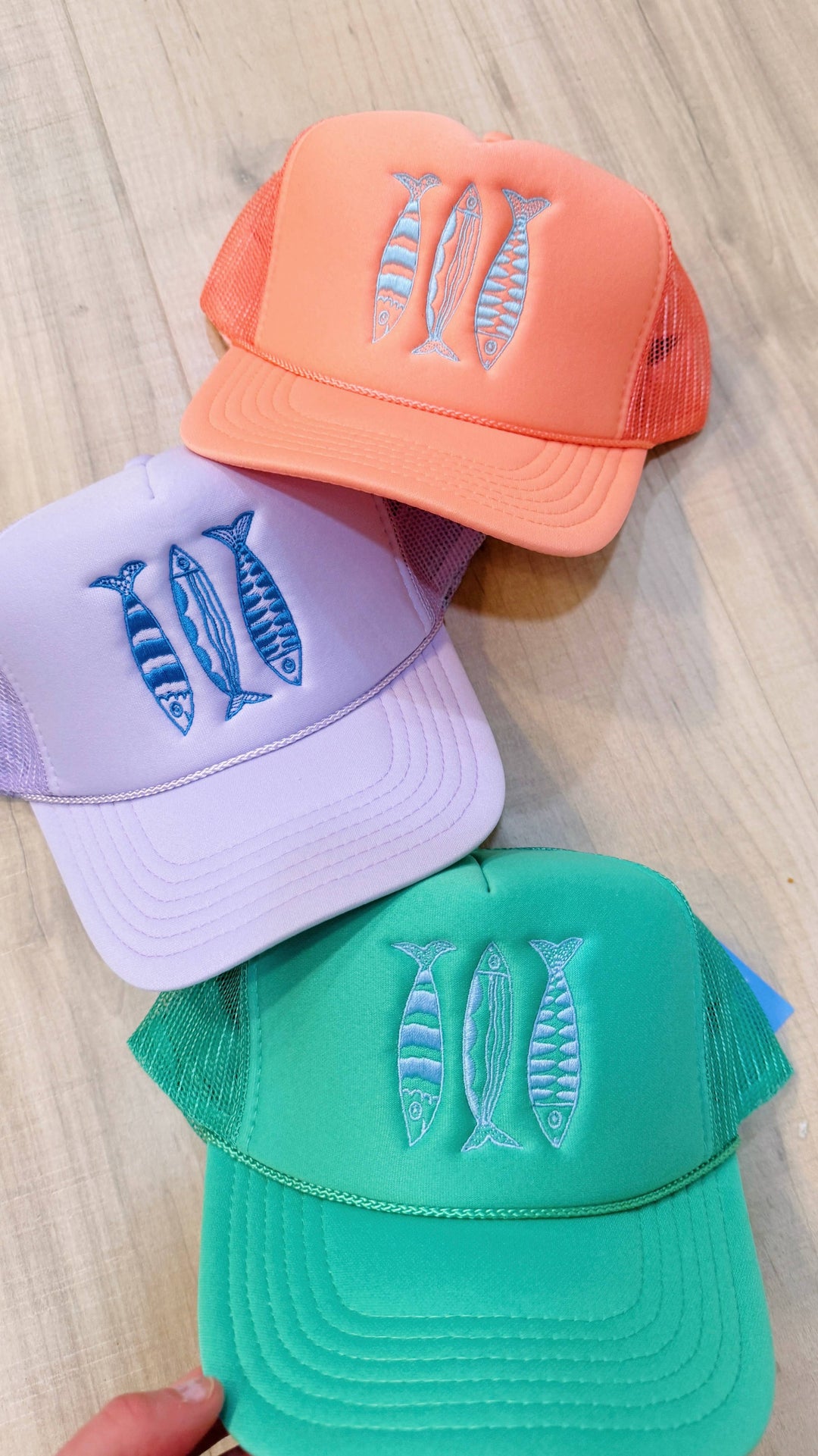 Sardine Summer Trucker Hat: Coral hat | light blue thread